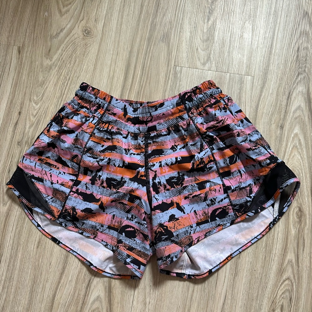 Lululemon Athletica Hotty Hot short - low rise 4 inch- orange,pink,blue stripe